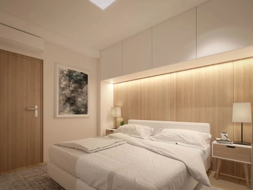 Chambre moderne avec tête de lit en bois clair et éclairage LED intégré