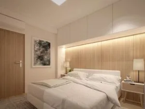 Chambre moderne avec tête de lit en bois clair et éclairage LED intégré